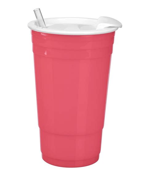 a pink cup with a straw sticking out of it