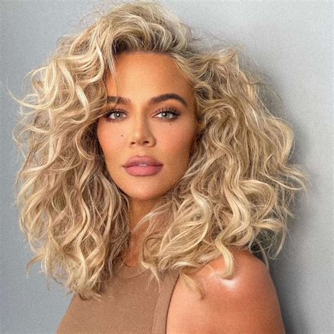 Khloé Kardashian Brings Her Abs — and Natural Curly Hair — to Instagram