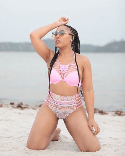 Simphiwe Ngema serves some sauce in her bikinis