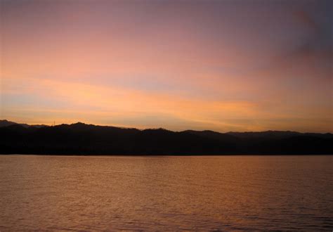 rosy dawn  lake kivu drc  stock photo public domain pictures