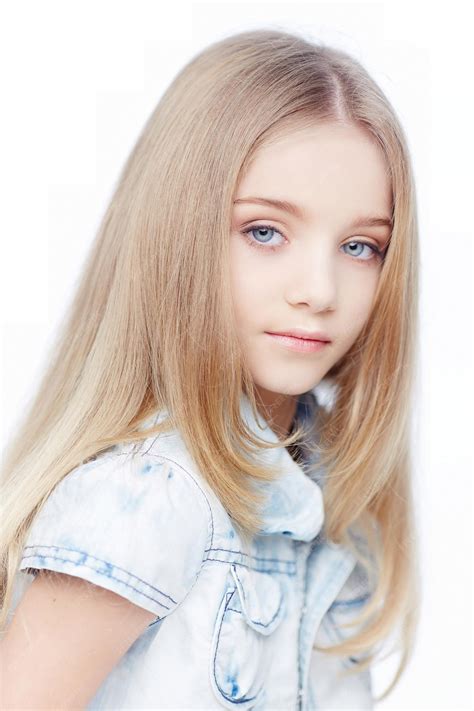 Premium Photo | Young girl with long blond hair.