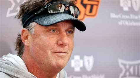 OSU football coach Mike Gundy recalls wrestling trips with John Smith