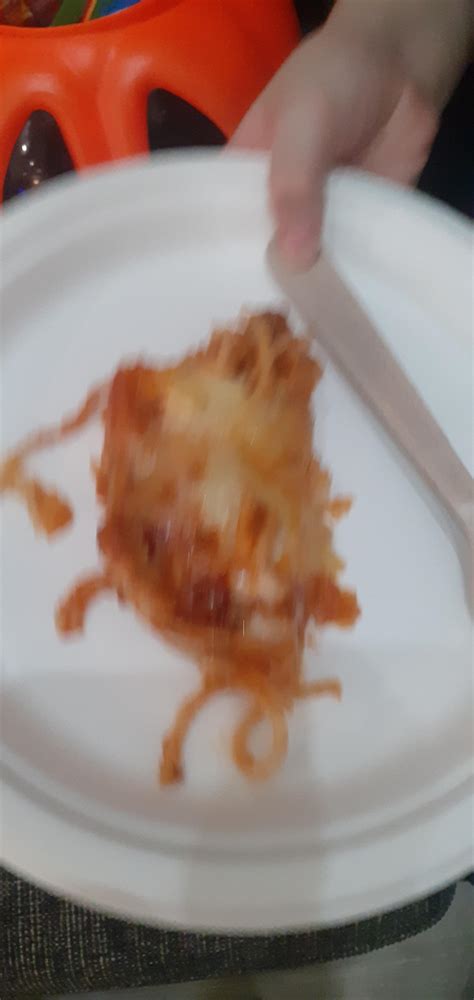 My cousin's snack of Spag-sagna-za (Spaghetti/Lasana/Pizza). This is