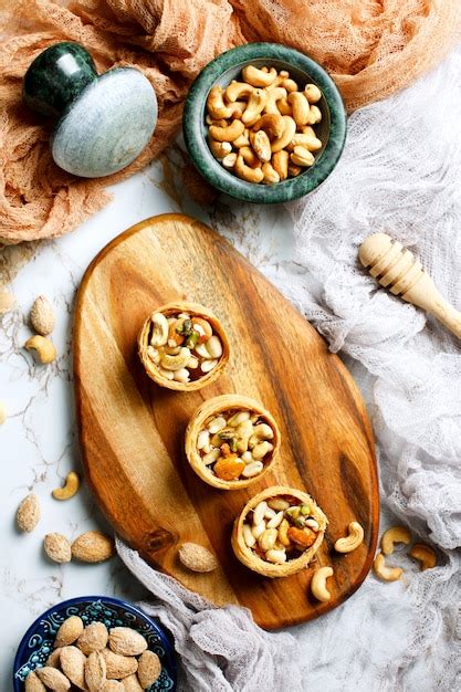 premium photo assorted nuts  honey topping