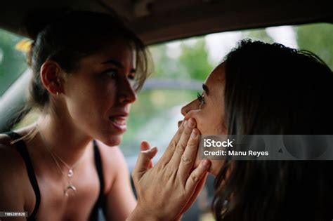 young lesbians enjoying   car stock photo  image