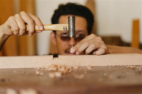 Creative female artisan drawing in workshop · Free Stock Photo