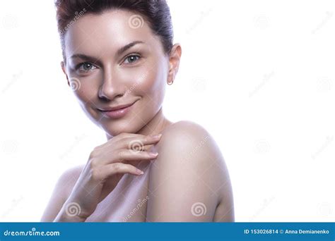 Cute Brunette Woman with Nude Make Up. Clean Flawless Fresh Skin Stock