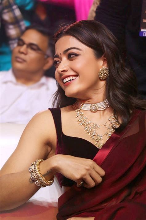 rashmika mandanna striking   burgundy saree  pushpa  launch
