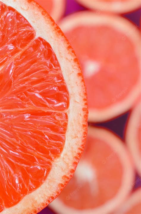 Premium Photo | Top view of a fragment of the red grapefruit slice on