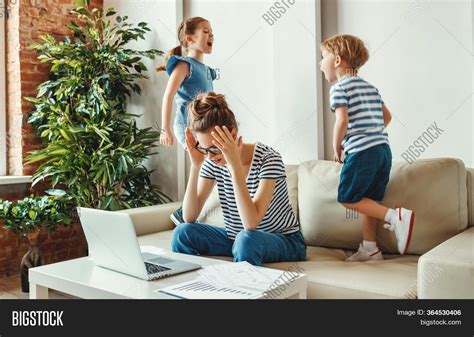 Tired Young Mother Image & Photo (Free Trial) | Bigstock