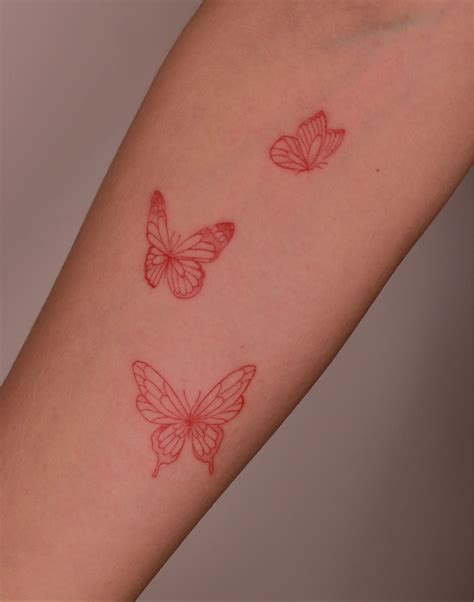 Top more than 74 small red butterfly tattoo best - in.cdgdbentre