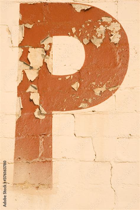 Old, faded, worn and used letters, alpha numeric set character that ...