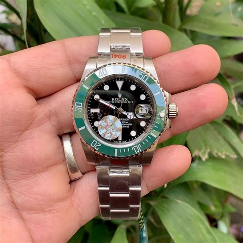 Rolex Submariner Green Black Dial - Celebrity Watches