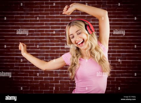 beautiful woman dancing  headphones stock photo alamy