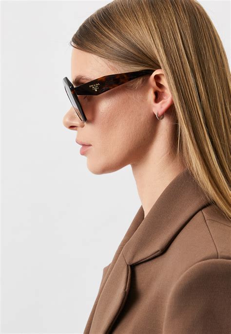 Женские солнцезащитные очки Prada (Прада) 0PR 16WS цвет коричневый ...