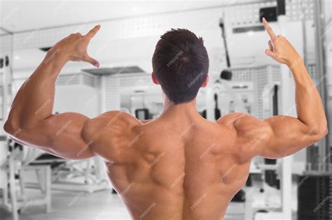Premium Photo | Bodybuilder bodybuilding muscles back gym strong muscular