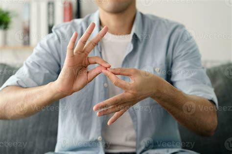 happy young deaf man  sign language  communicate