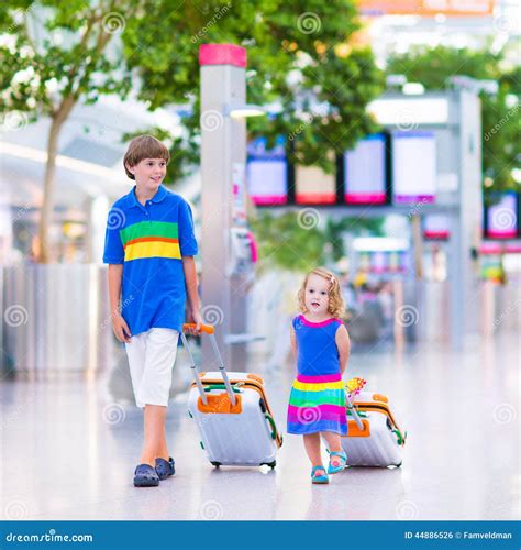 Family at the airport stock photo. Image of airplane - 44886526