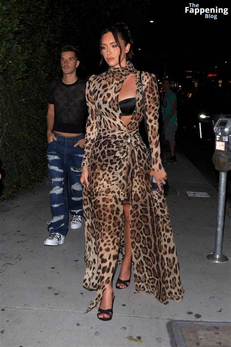 Anastasia Karanikolaou is Seen in a Leopard Print Dress at the D&G Logo