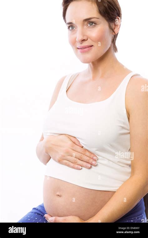 Pregnant woman smiling Stock Photo - Alamy