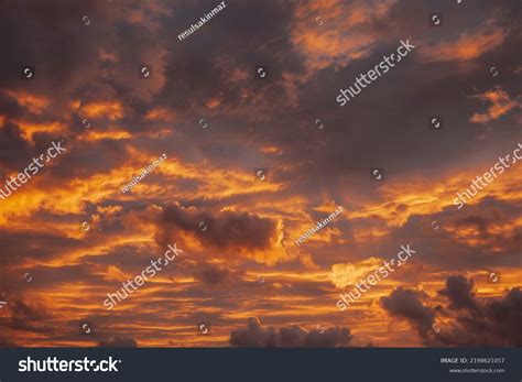 yellow cloudy sky sunset stock photo  shutterstock