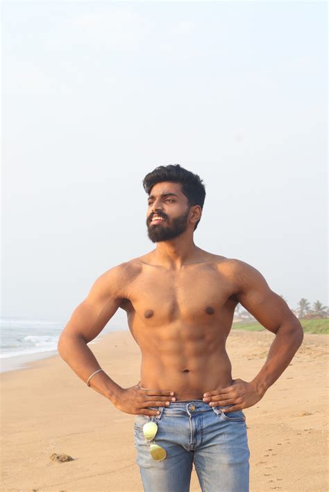 Fitness model posing on beach - PixaHive
