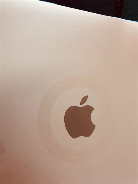 What is the ring design around the logo on MacBook air? : r/macbook