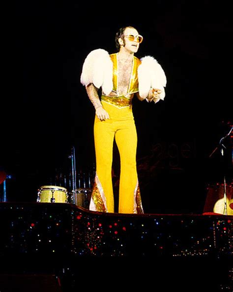 Elton John's Outfits Through the Years | Elton john costume, Elton john ...