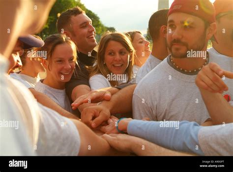 Hands together for team spirit Stock Photo - Alamy