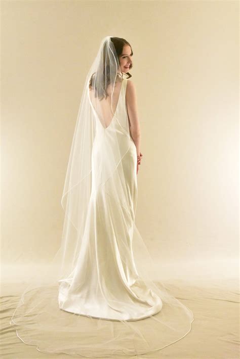 Cascading Cathedral Veil with Cord Ribbon Edge | WeddingVeil.com