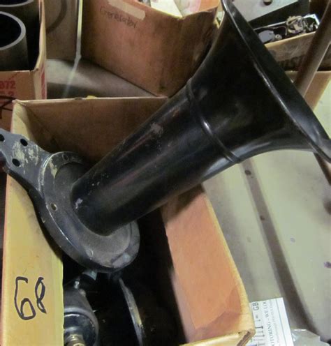 Bonhams Cars : A large Klaxon horn and assorted Klaxon parts.