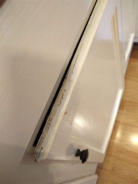 how to fix cabinet door that won't close