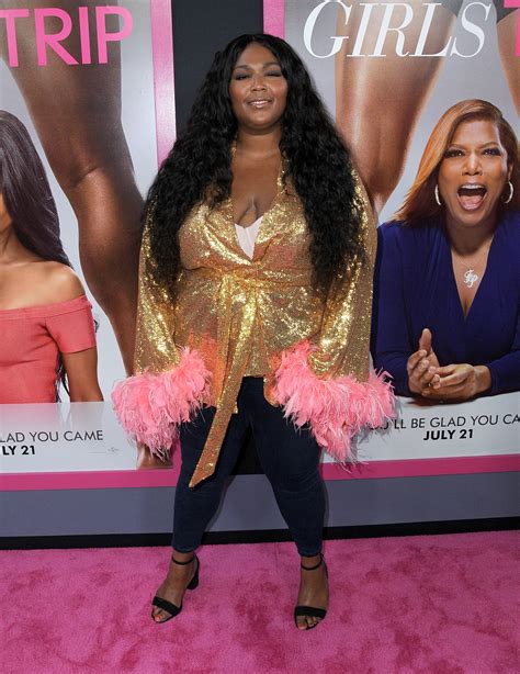 Lizzo, 36, Flaunts Her 'Little Waist' in a Black Two-Piece in New