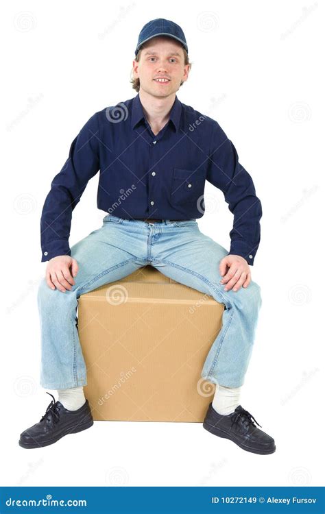 Young Man Sitting On The Cardboard Box Stock Image - Image: 10272149