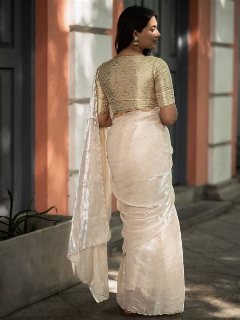 white glazy organza saree  hand embroidery scallop edge design