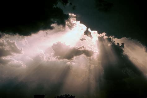 Sunlight Through Dark Clouds Sun Through Clouds Stock Photos, Royalty