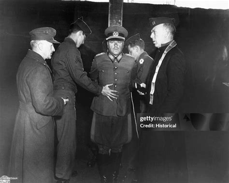 German General Anton Dostler is tied to a stake before his execution