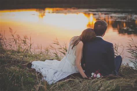 Married Couple Sitting At Lake Watching Sunset Wallpaper,HD Love