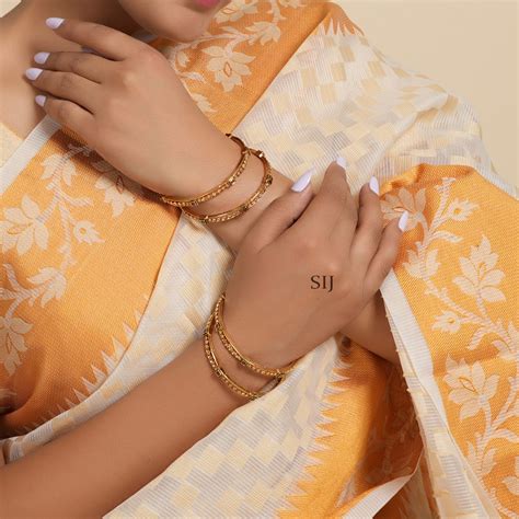 Astonishing Stone Studded Gold Plated Bangle Set (Set of 4) - South