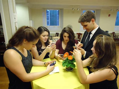 File:Young people texting on smartphones using thumbs.JPG - Wikimedia