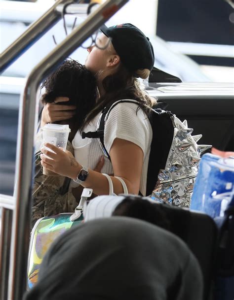 JOJO SIWA Kissing an Unidentified Woman as at LAX 05/30/2024 – HawtCelebs