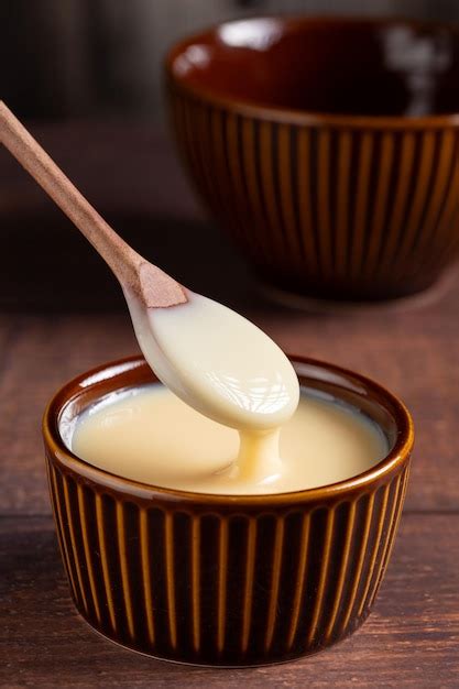 Premium Photo | Fresh condensed milk in the bowl