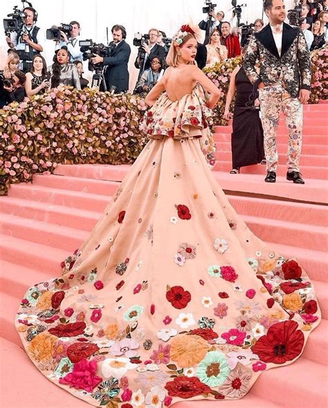 Unveiling The Extravagance Of Met Gala DTI Outfits