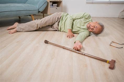 Older Senior Man Headache Lying on the Floor after Falling Stock Image ...
