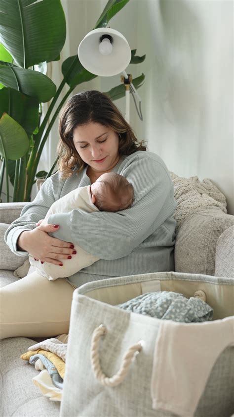 Mother Holding Baby in Arms · Free Stock Video