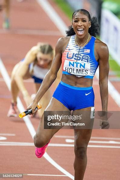 Alexis Holmes of the United States celebrates her team's gold medal