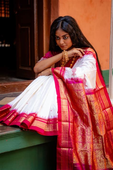 buy white kanjivaram silk saree  red border traditional wear