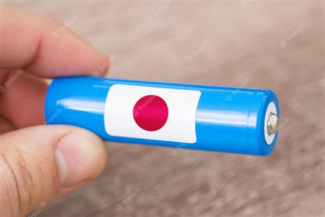 Premium Photo | Flag of japan on rechargeable liion battery concept of ...