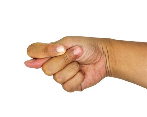 Thumb of left hand between index and middle finger - human hand gesture