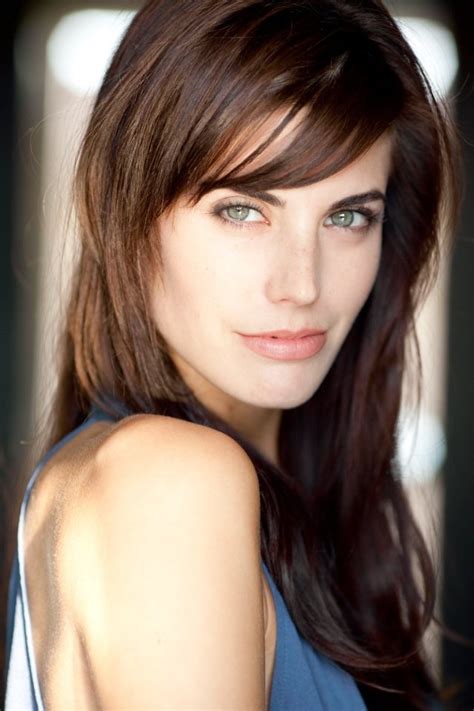 a close up of a person with long hair